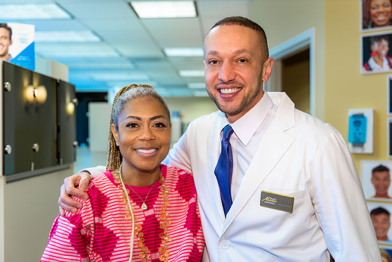 Dr. Nahlah with a patient at the practice