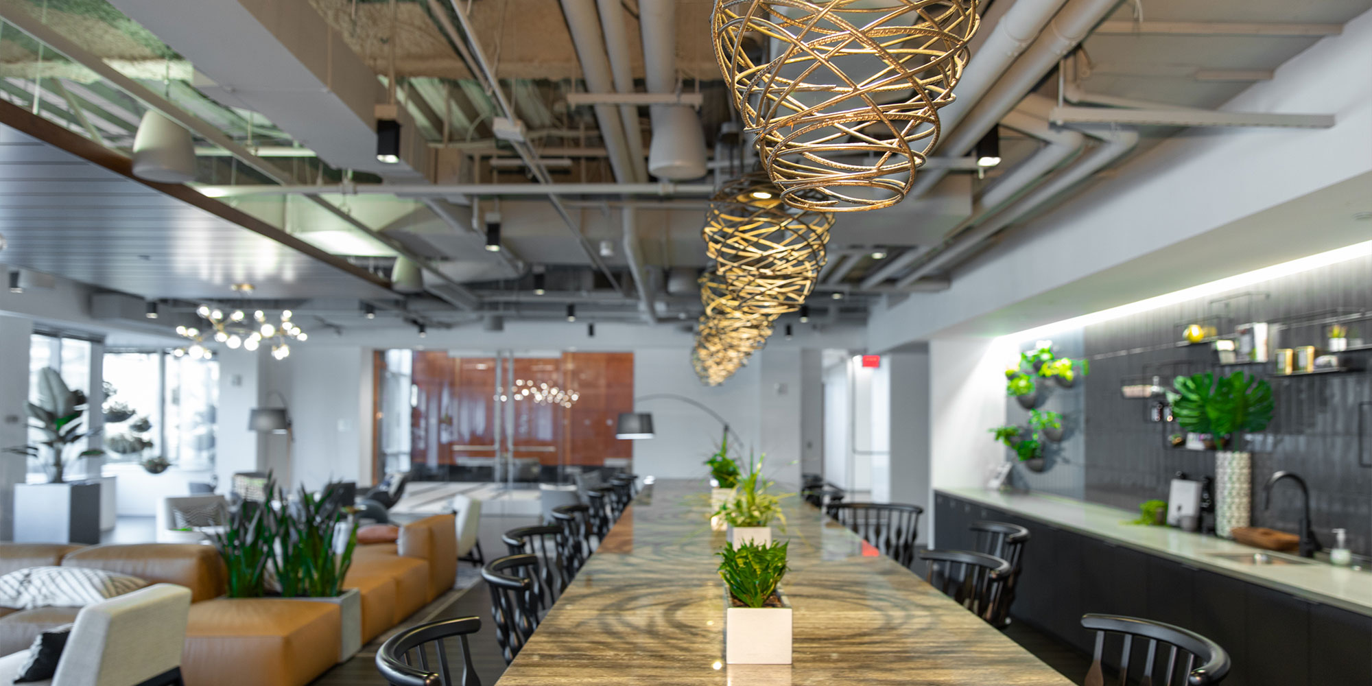 The lounge and communal table in the practice's building